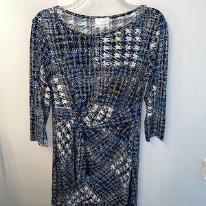 Blue and black speckled faux-wrap dress.